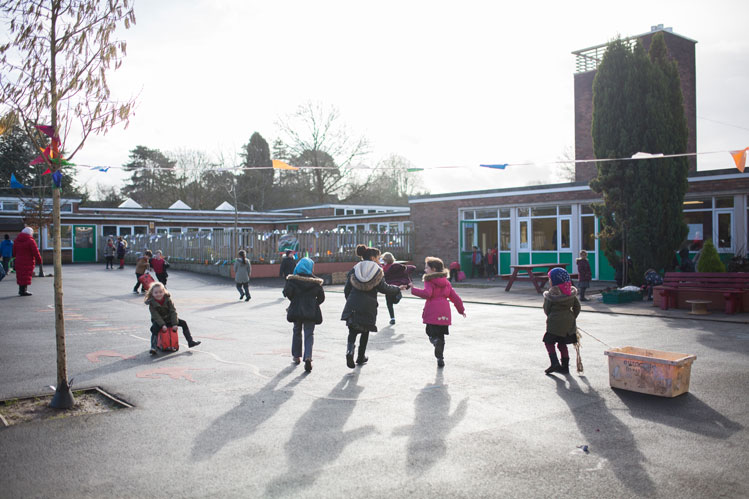 primary school teacher on playground duty